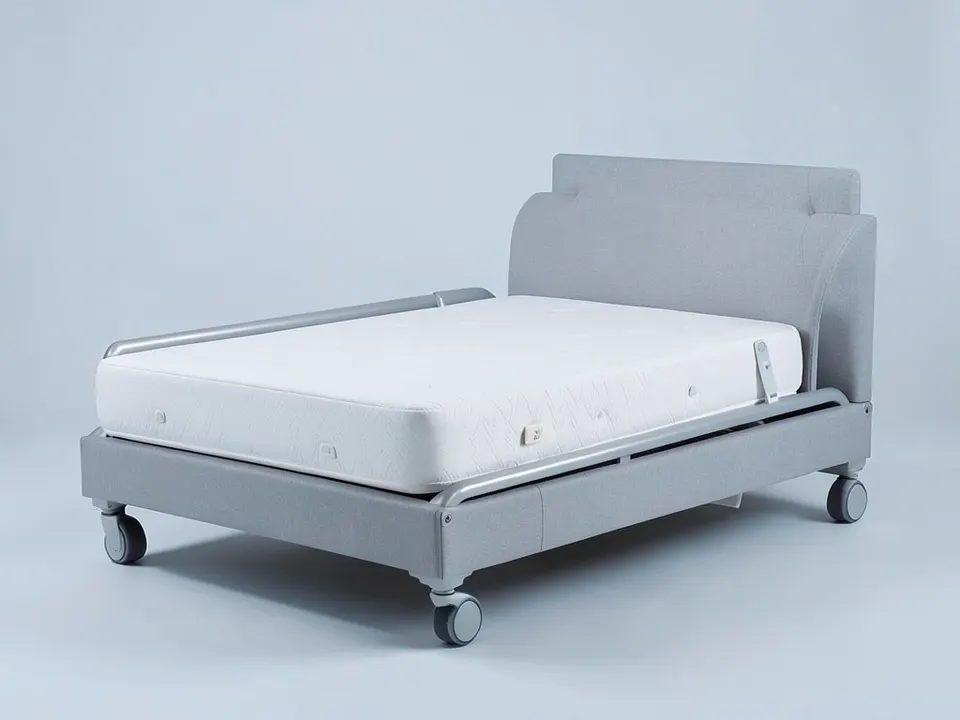 Adjustable home care bed on locking wheels with side rails