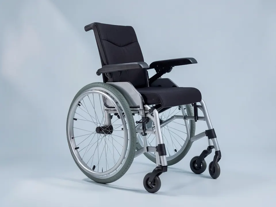 Folding manual wheelchair with a grey gel seat cushion